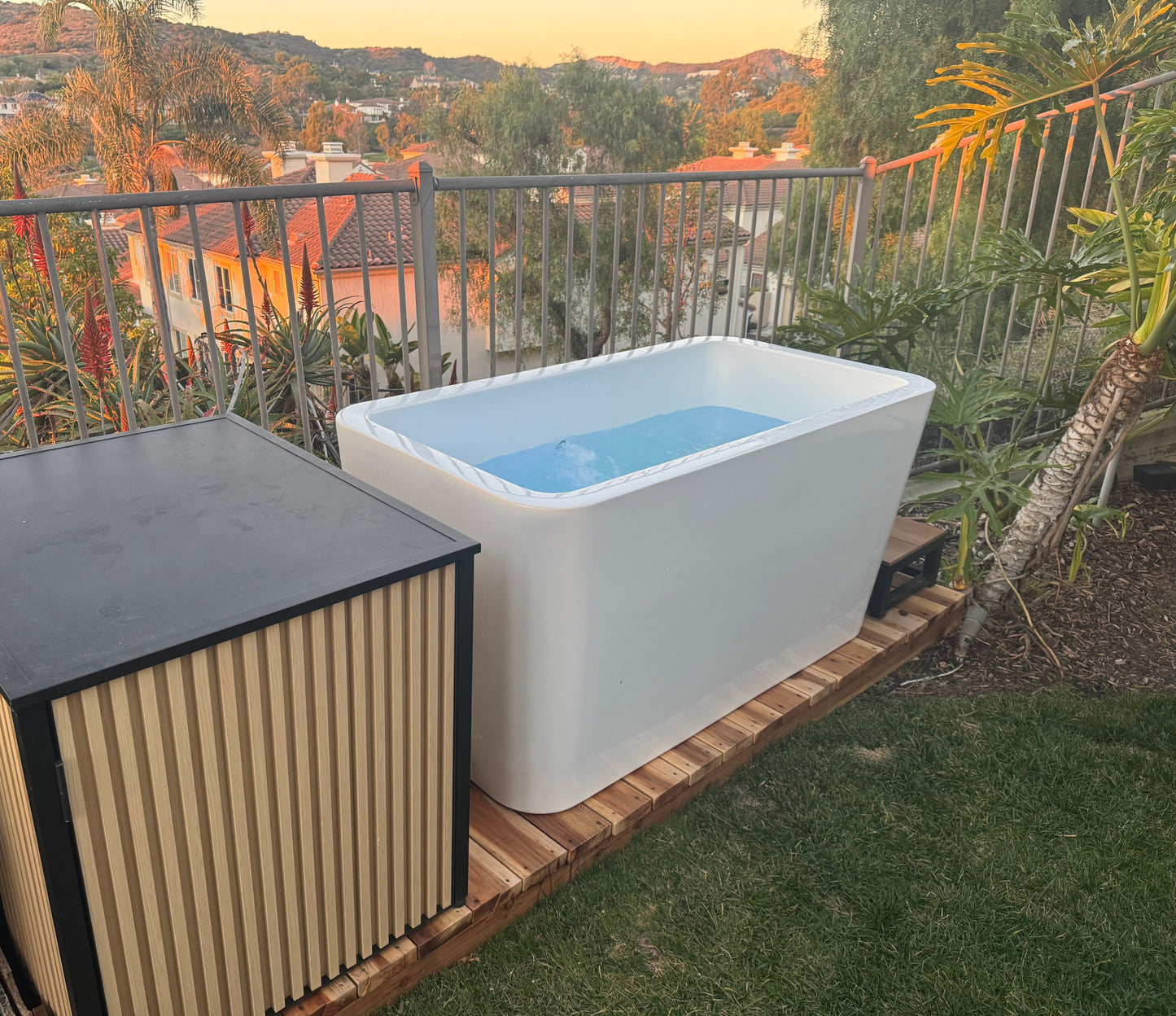 RevX X Tub + LUX Chiller System — landscaped backyard setting